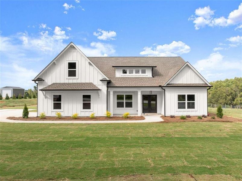 Front exterior of a new home in , Maysville, GA, highlighting curb appeal (Image 24). Front exterior of a new home in , Maysville, GA, highlighting curb appeal (Image 24).