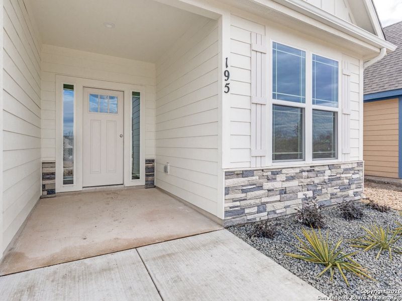 Exterior details and patio area of a home in Marion Park, Marion (Image 17).