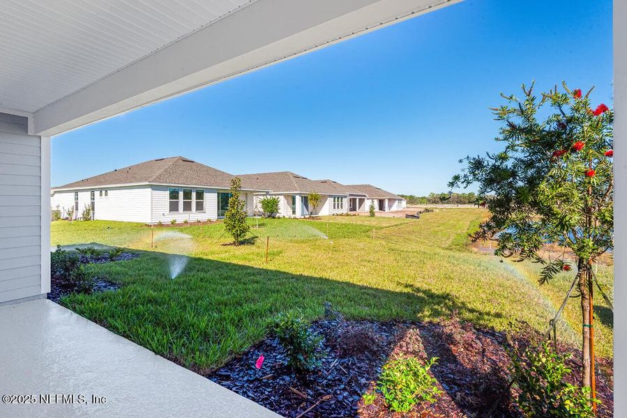 Exterior details and patio area of a home in Colbert Landings, Palm Coast (Image 26).