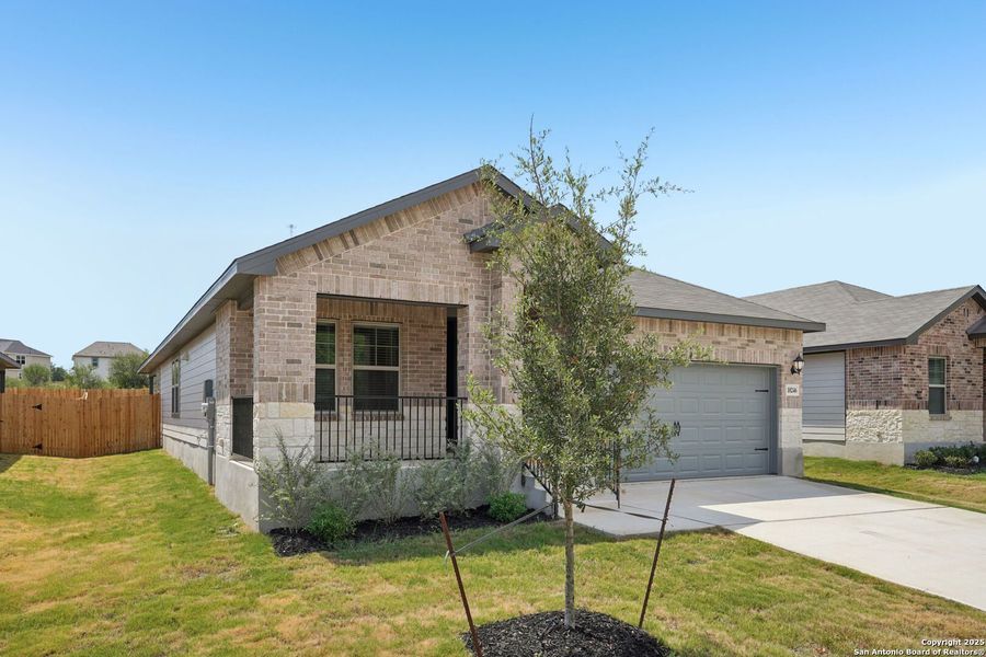 Front exterior of a new home in Royal Crest, San Antonio, TX, highlighting curb appeal (Image 2). Front exterior of a new home in Royal Crest, San Antonio, TX, highlighting curb appeal (Image 2).