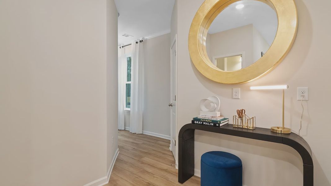 Stylish foyer entry in new townhome in Riverdale, GA featuring decorative trim and contemporary finishes.