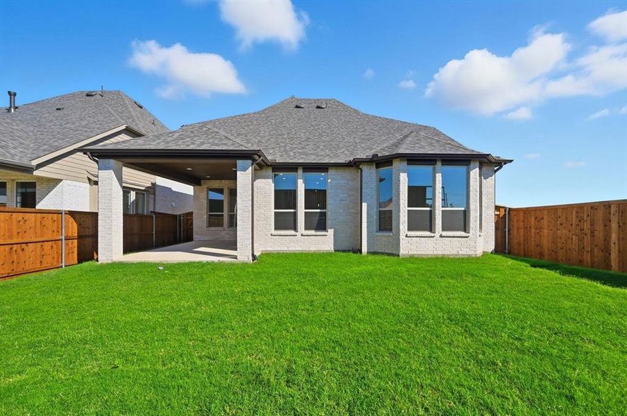 Exterior details and patio area of a home in Wildridge, Oak Point (Image 2). Exterior details and patio area of a home in Wildridge, Oak Point (Image 2).