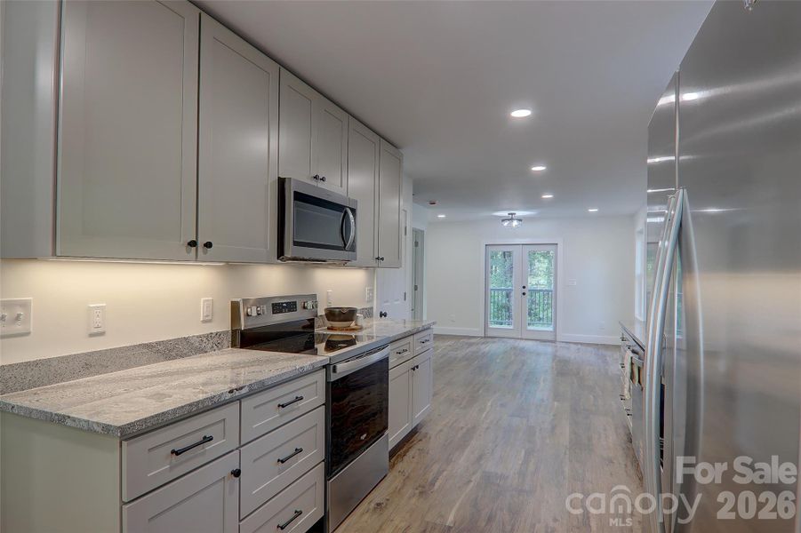 Furnished interior view inside a new home in , Waynesville (Image 20).