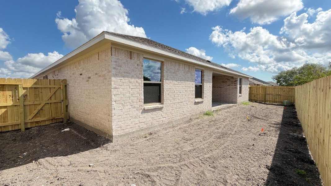 Exterior details and patio area of a home in The Lakes Northwest, Corpus Christi (Image 22).