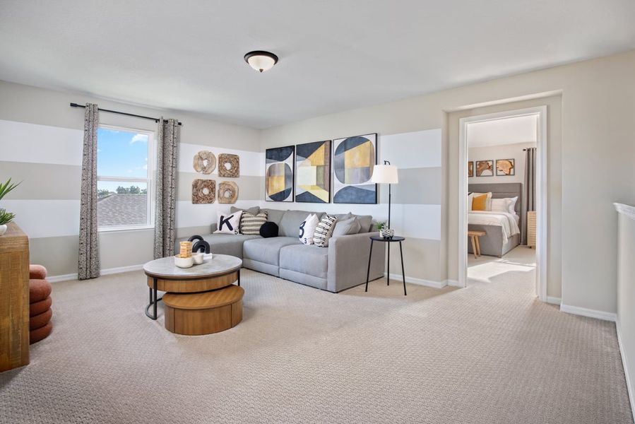 Representative furnished interior of a home built from the 2107 by KB Home in Naples Village at Verona I, Titusville (Image 8).