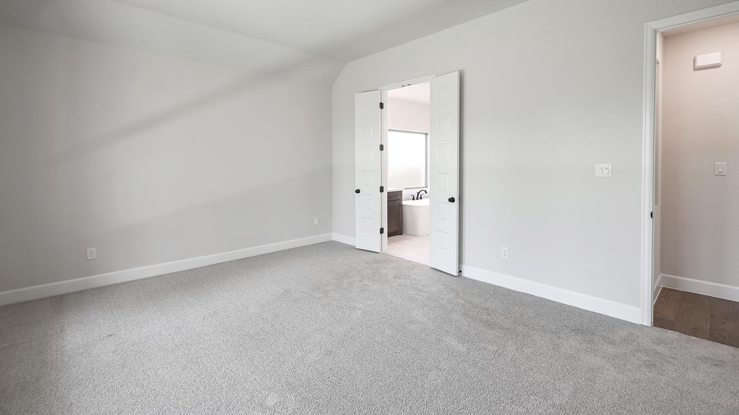 Spacious, unfurnished interior of a new home in 6 Creeks, Kyle (Image 16).