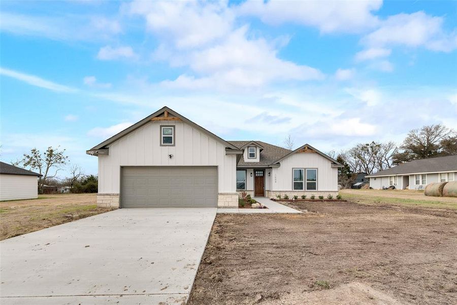 View of front of property with a garage