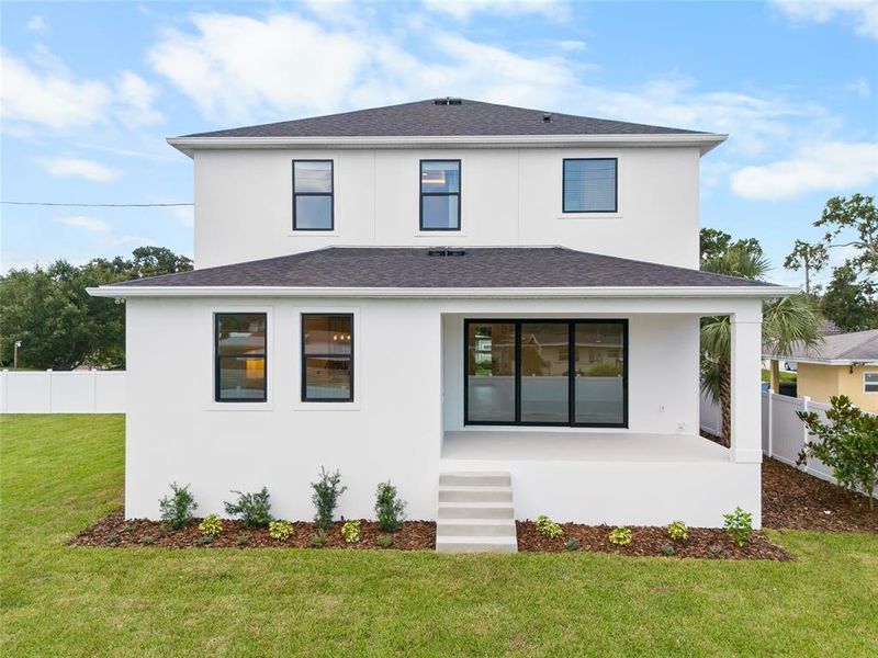 Front exterior of a new home in , Tampa, FL, highlighting curb appeal (Image 24).