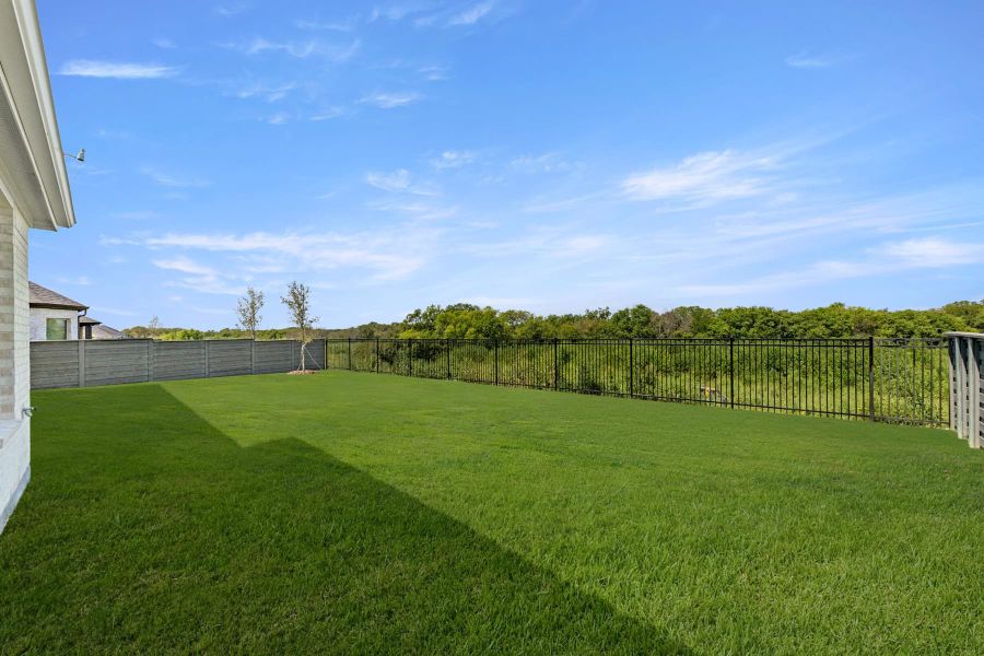Exterior details and patio area of a home in Union Park, Little Elm (Image 3).