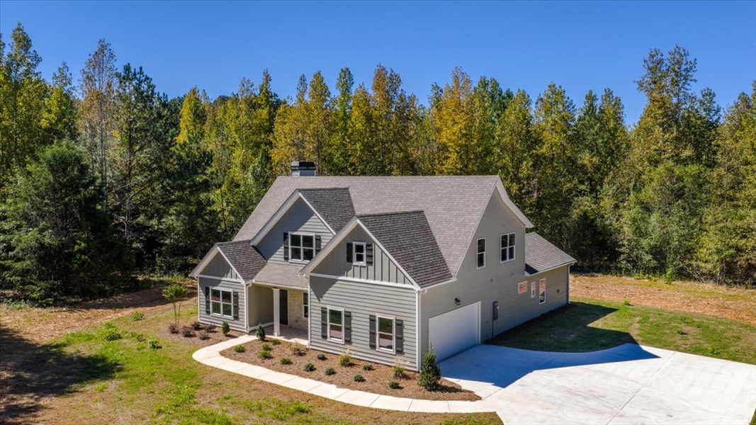 Front exterior of a new home in Collier Grove, Thomaston, GA, highlighting curb appeal (Image 20).