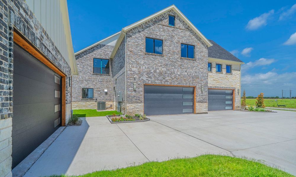 Front exterior of a new home in Hidden Valley I, Princeton, TX, highlighting curb appeal (Image 21). Front exterior of a new home in Hidden Valley I, Princeton, TX, highlighting curb appeal (Image 21).