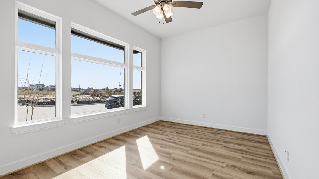 Representative furnished interior of a home built from the Paloma by Brightland Homes in Bridgeland Central, Cypress (Image 12).