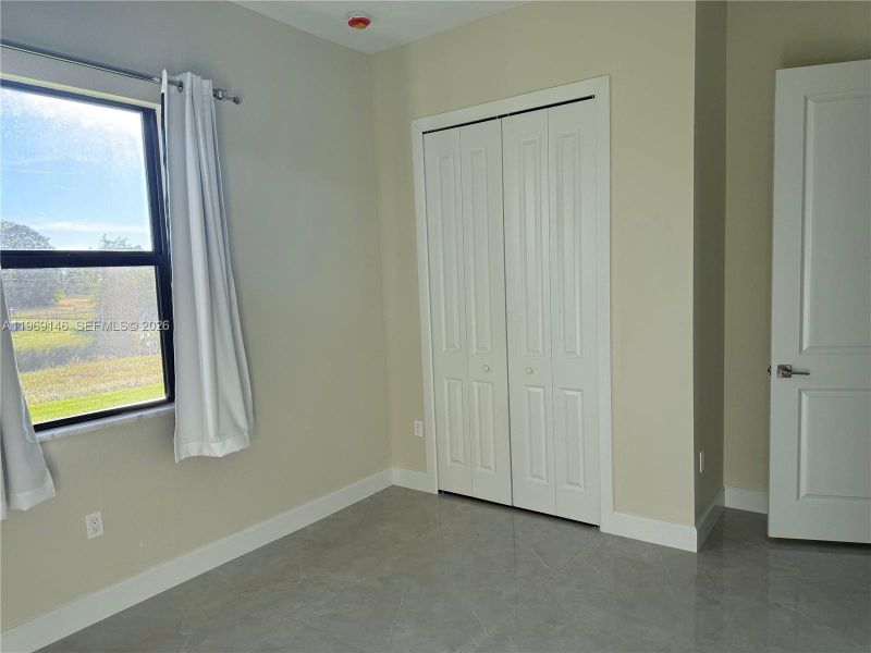 Spacious, unfurnished interior of a new home in , Lehigh Acres (Image 21).