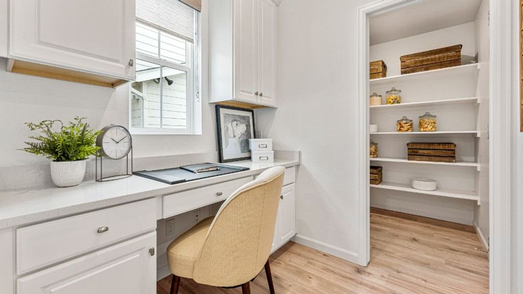 Furnished interior view inside a new home in The Aurora Highlands, Aurora (Image 14).