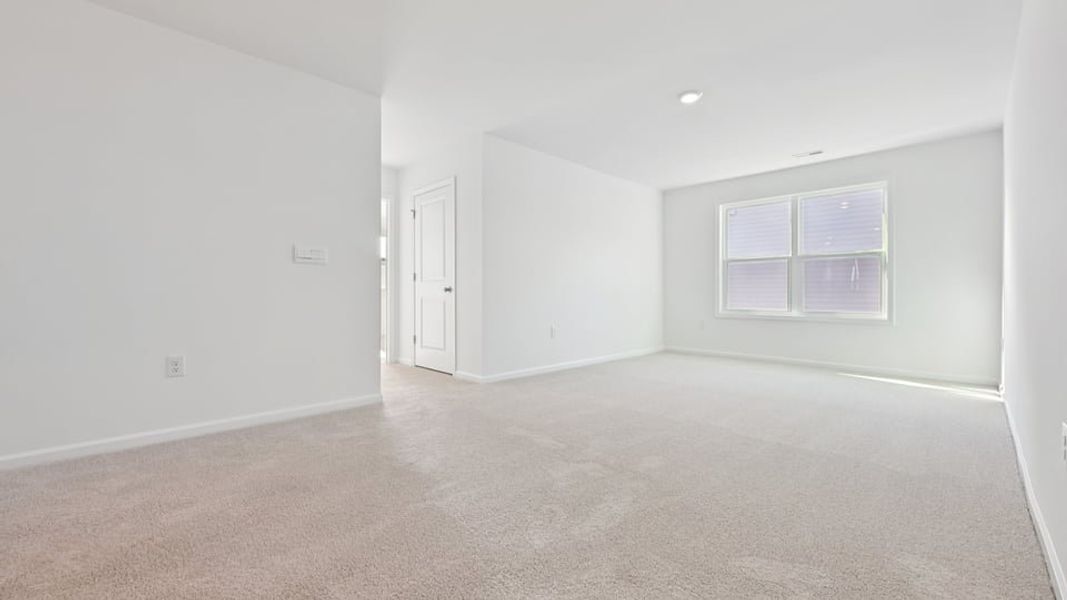 Representative unfurnished interior of a home built from the Wylie by D.R. Horton in Eagle Creek, Fuquay Varina (Image 24).