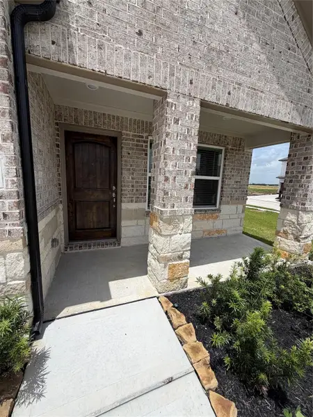 Exterior details and patio area of a home in Creekhaven, Iowa Colony (Image 17). Exterior details and patio area of a home in Creekhaven, Iowa Colony (Image 17).