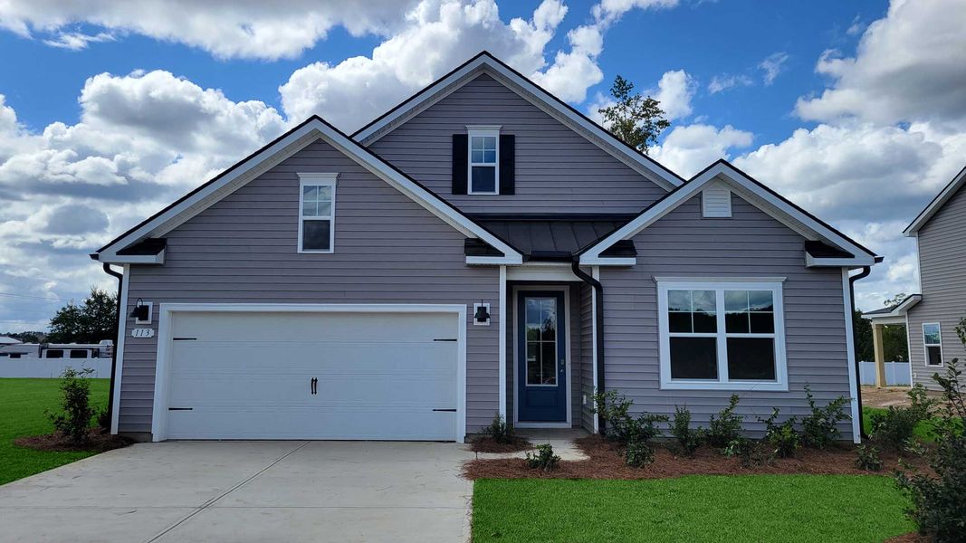 Front exterior of a new home in Coastal Farms, Conway, SC, highlighting curb appeal (Image 1). Front exterior of a new home in Coastal Farms, Conway, SC, highlighting curb appeal (Image 1).
