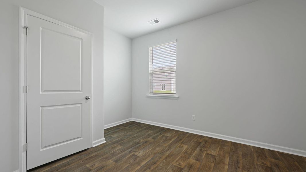 Spacious, unfurnished interior of a new home in Pine Hills at Cane Bay, Summerville (Image 27). Spacious, unfurnished interior of a new home in Pine Hills at Cane Bay, Summerville (Image 27).