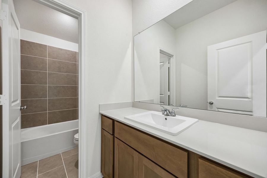 Furnished interior view inside a new home in Riviera Pines, Huffman (Image 15).