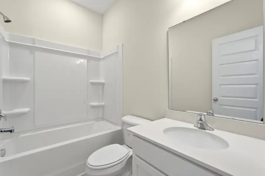 Representative furnished interior of a home built from the The Catherine by RTS Homes in Tibet Road at Sassafras, Allenhurst (Image 14).