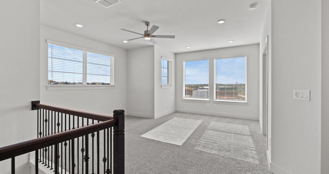 Representative unfurnished interior of a home built from the Waterloo by Chesmar Homes in Sunfield, Buda (Image 20).