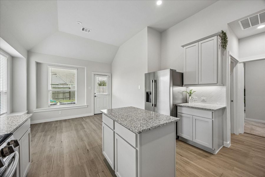 Furnished interior view inside a new home in Sierra Vista, Iowa Colony (Image 7).