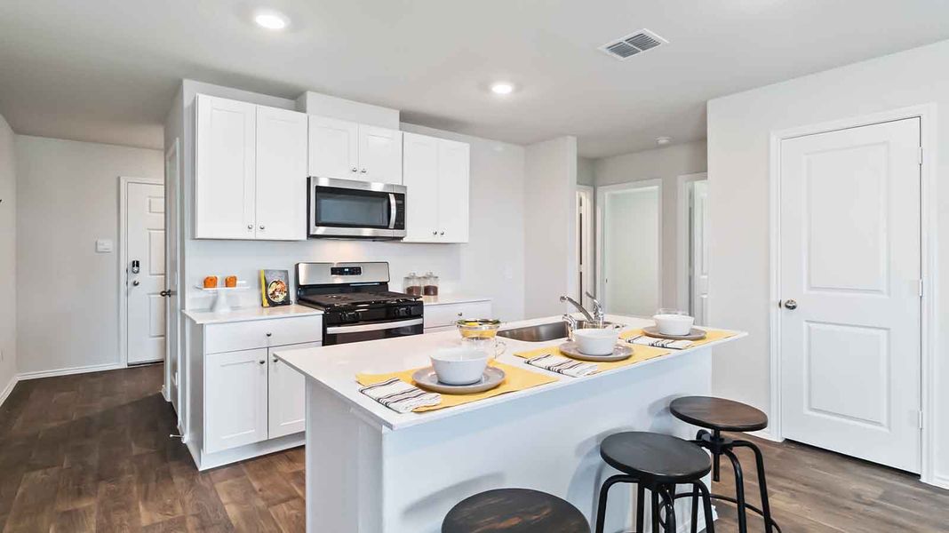 Representative furnished interior of a home built from the Barton by D.R. Horton in Watermark, Alvin (Image 5).
