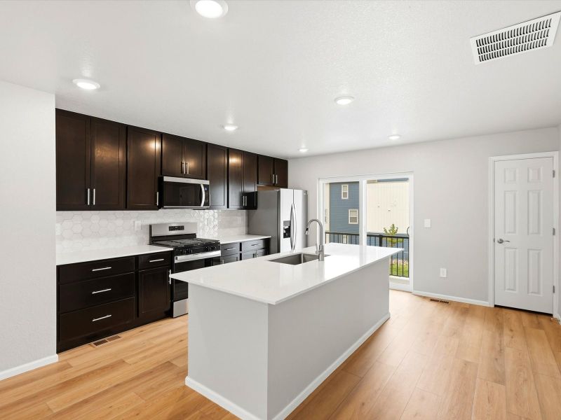 Furnished interior view inside a new home in Three Hills, Morrison (Image 4). Furnished interior view inside a new home in Three Hills, Morrison (Image 4).