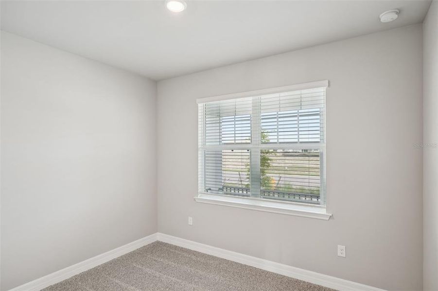 Spacious, unfurnished interior of a new home in Crescent Lakes - Signature Series, Punta Gorda (Image 17).