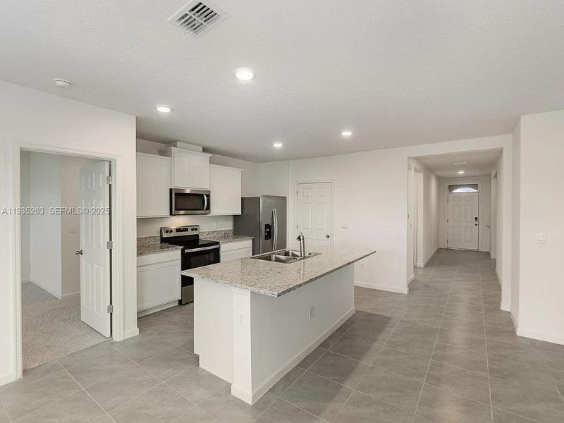 Furnished interior view inside a new home in , Fort Pierce (Image 3).
