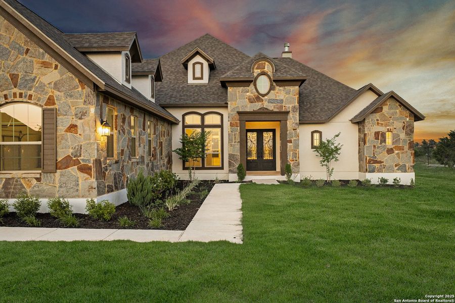 Front exterior of a new home in Potranco Acres, Castroville, TX, highlighting curb appeal (Image 20).