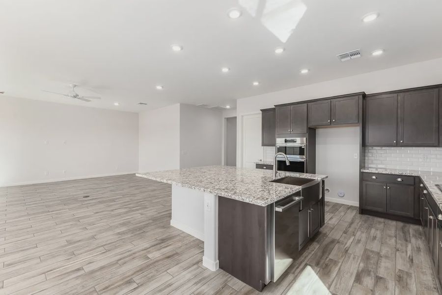 Furnished interior view inside a new home in Valencia at Granite Vista, Waddell (Image 6).