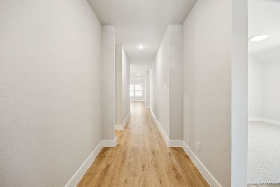 Representative unfurnished interior of a home built from the Adolphus by Centre Living Homes in Painted Tree Woodland West, McKinney (Image 20).