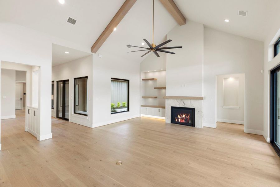 Stunning vaulted ceiling in living area w custom cabinetry Stunning vaulted ceiling in living area w custom cabinetry