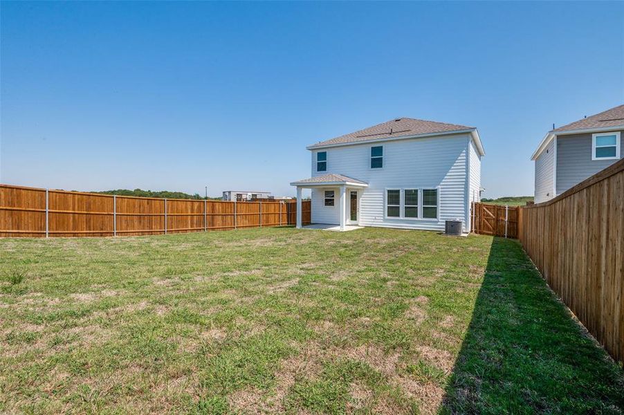 Front exterior of a new home in Cottonwood Creek, Seagoville, TX, highlighting curb appeal (Image 16).