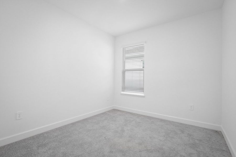 Spacious, unfurnished interior of a new home in The Cove at West Port, Port Charlotte (Image 24).