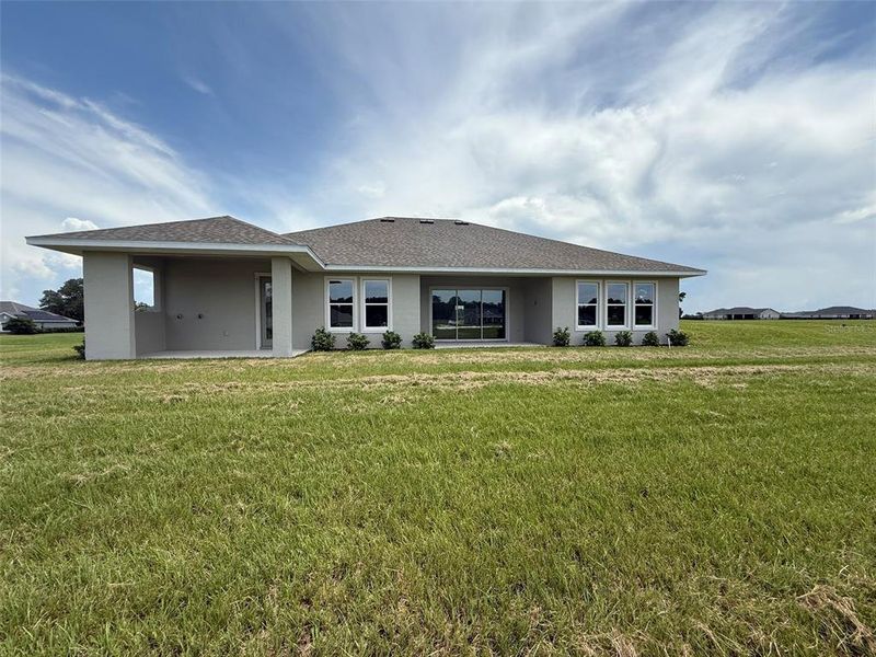 Front exterior of a new home in , Ocala, FL, highlighting curb appeal (Image 9).