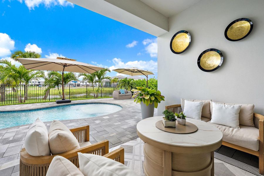 Large 34'8'' x 9'4'' covered patio near the heated pool and spa.