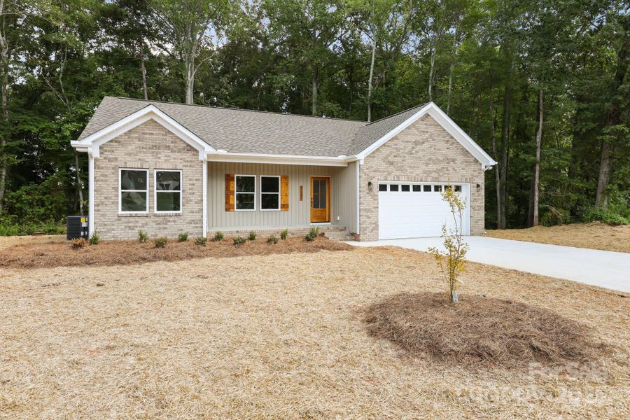 Front exterior of a new home in , Salisbury, NC, highlighting curb appeal (Image 22).
