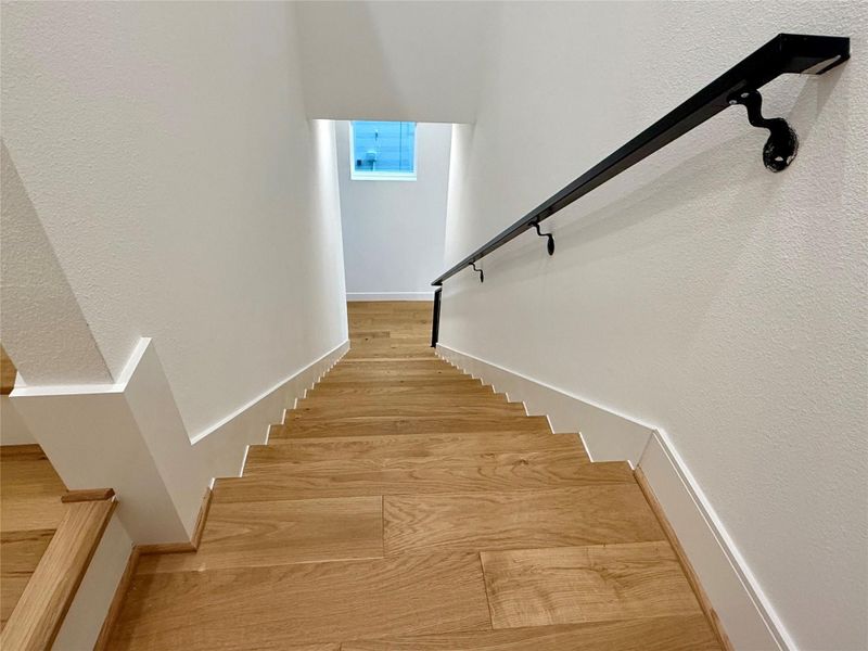 Elegant wood treads in this contemporary design.