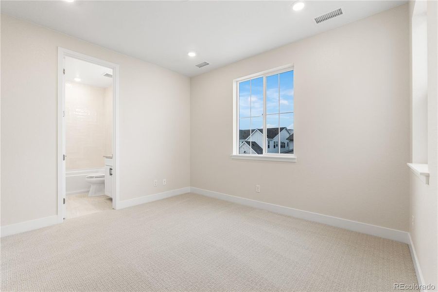 Spacious, unfurnished interior of a new home in Luxe at The Canyons, Castle Pines (Image 39).