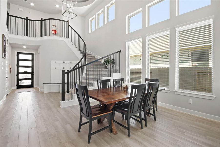 Separate dining area that is connected to entry, kitchen and living area.