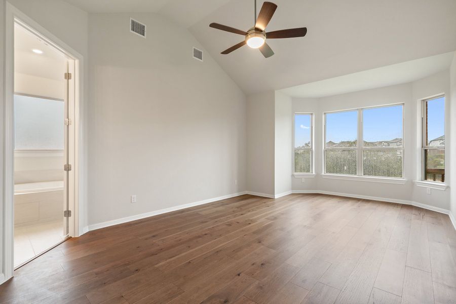 Representative unfurnished interior of a home built from the Palmer by Ashton Woods in The Estates at La Cima, San Marcos (Image 44).