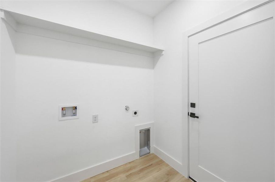 Laundry area hookup for a gas dryer, washer hookup, and electric dryer hookup Laundry area hookup for a gas dryer, washer hookup, and electric dryer hookup