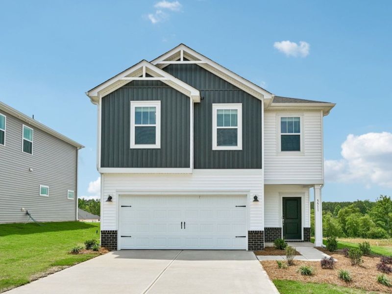 Front exterior of a new home in Calico Creek, Cherryville, NC, highlighting curb appeal (Image 1). Front exterior of a new home in Calico Creek, Cherryville, NC, highlighting curb appeal (Image 1).
