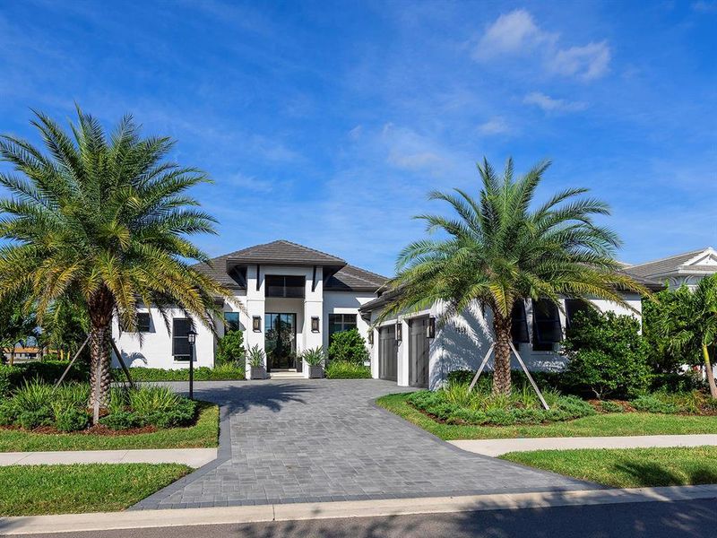 Front exterior of a new home in , Sarasota, FL, highlighting curb appeal (Image 27). Front exterior of a new home in , Sarasota, FL, highlighting curb appeal (Image 27).