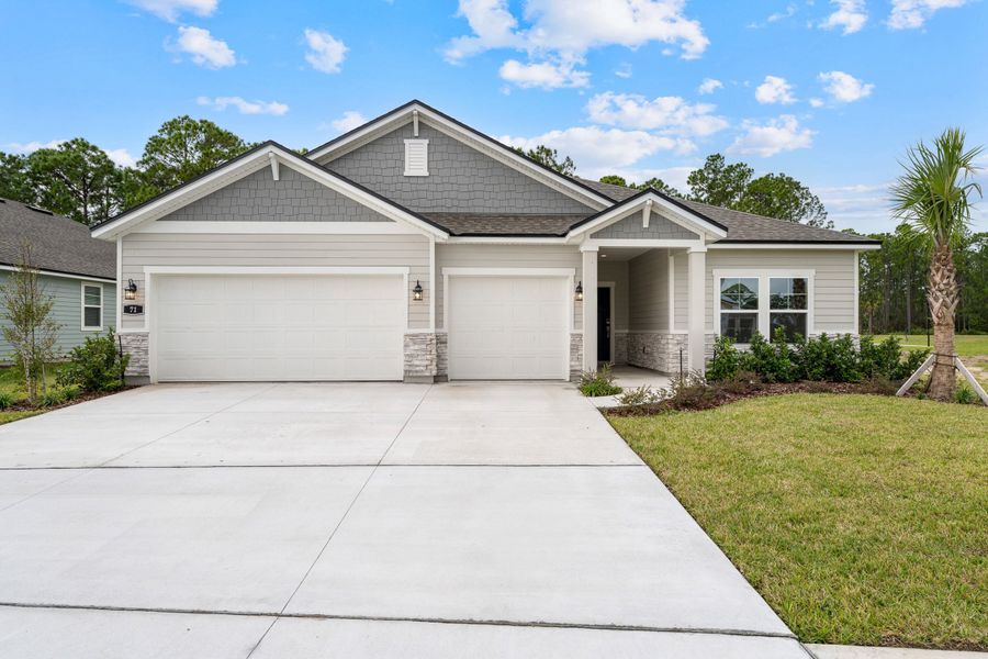 Representative exterior photo of a completed home built from the Everglade by Century Communities in Reserve East, Flagler Beach, FL (Image 1). Representative exterior photo of a completed home built from the Everglade by Century Communities in Reserve East, Flagler Beach, FL (Image 1).