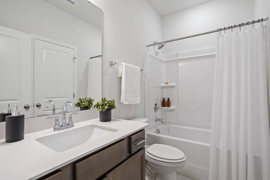 Furnished interior view inside a new home in Ovation at Sweetbrier, Durham (Image 22).