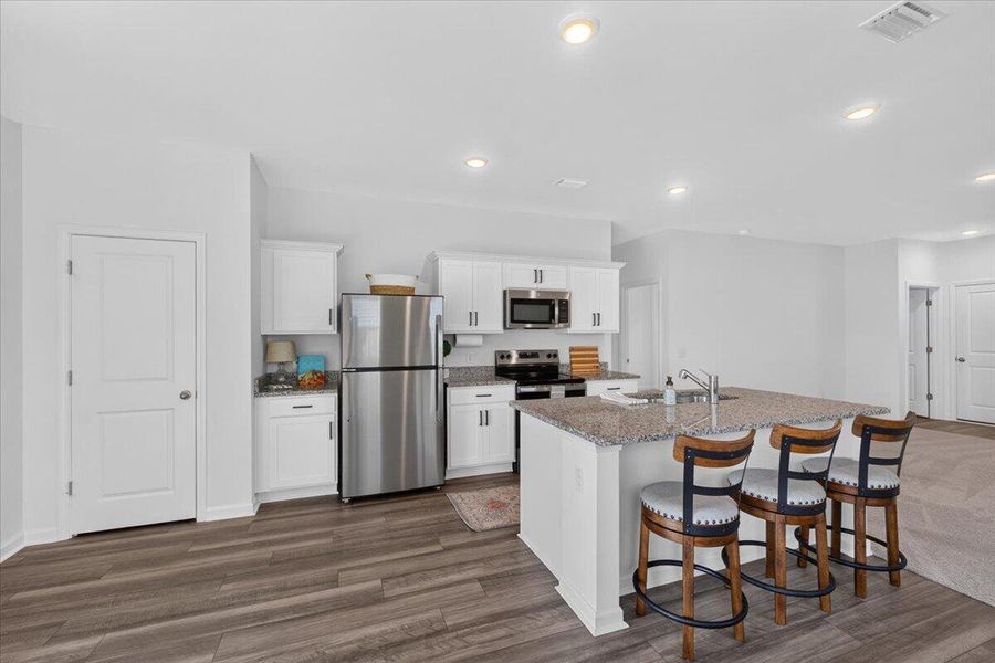 Furnished interior view inside a new home in Pender Woods at Cane Bay, Summerville (Image 18).
