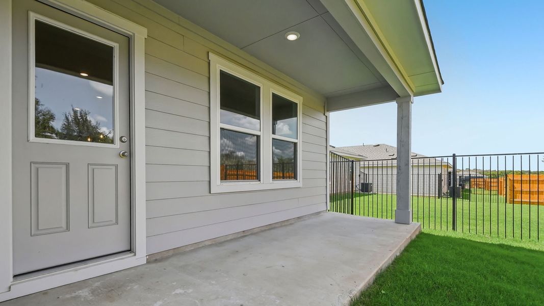 Exterior details and patio area of a home in Trails at Wildhorse, Austin (Image 3).